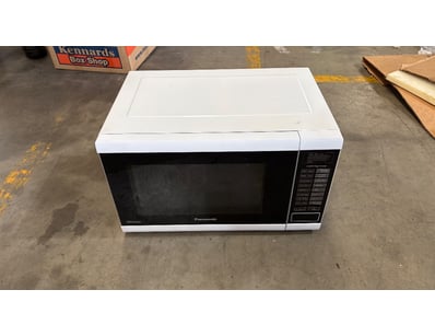 Panasonic microwave, white and black finish. Featu...