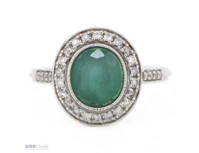 14K WHITE GOLD, EMERALD AND DIAMOND, HALO RING.   ...