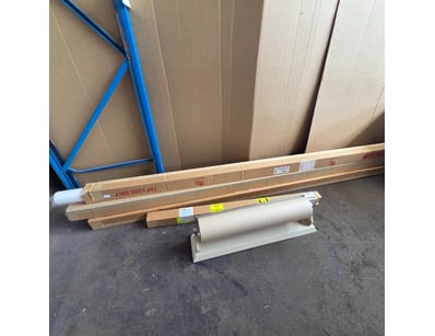 Contents comprise multiple lengths of white photog...
