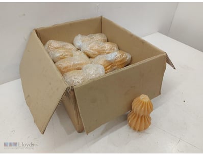 Bulk lot of decorative candles inpeach tones.  The...