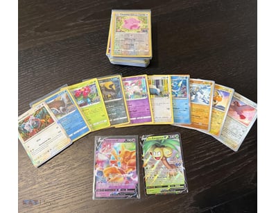 ASSORTED BULK POKÉMON CARDS INCLUDING HOLOS, V & M...