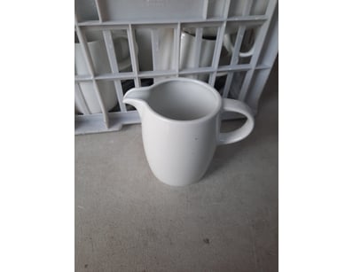 Milk jugs, white finish.

SOLD AS LOT.


