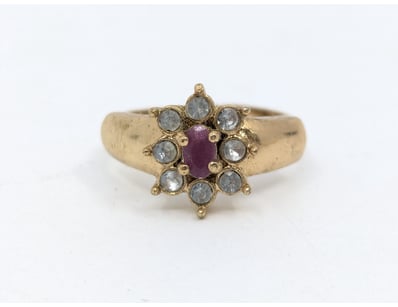 Ring with purple and white stones


