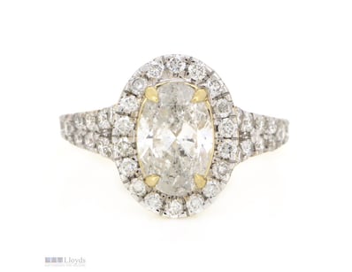 14K YELLOW GOLD AND DIAMOND, HALO SPLIT BAND RING....