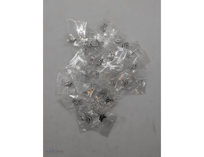 MIXED COLLECTION OF JEWELLED SILVER COLOURED LOCKE...