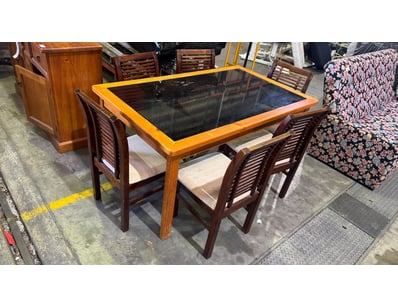 Wooden and glass dining table with chairs

