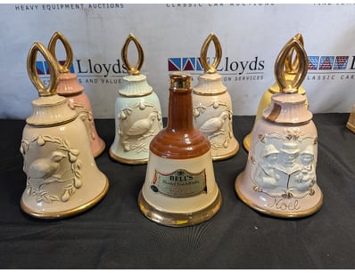 COLLECTION OF JIM BEAM CERAMIC WHISKY DECANTER BEL...