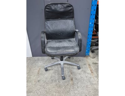 Leather style office chair, black finish.

