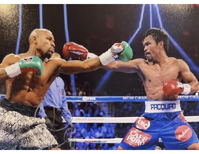 FLOYD MAYWEATHER V PACMAN SIGNED PHOTO 

Floyd May...