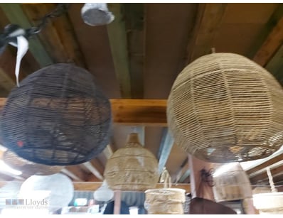 Set of two woven pendant light fixtures featuring ...