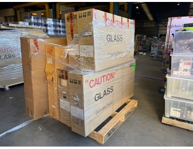 Bulk lot of genuine automotive glass components. S...