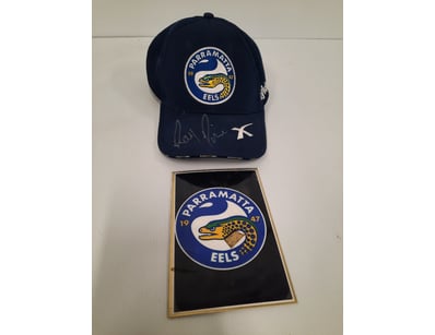 RAY PRICE SIGNED PARRAMATTA EELS CAP WITH BADGE

C...