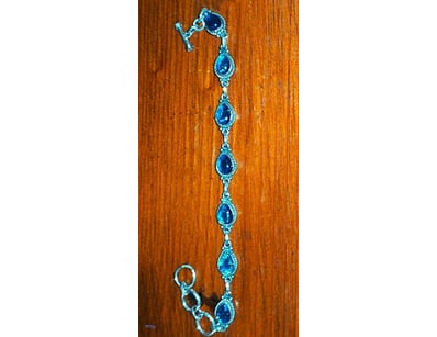 57.6 TCW STERLING SILVER AND TRIPLET OPAL BRACELET...