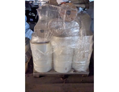 Pallet of commercial-grade paper products comprisi...