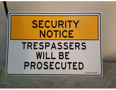 Signage "security notice trespassers will be prose...