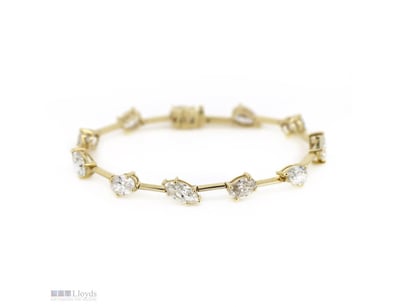 14K YELLOW GOLD AND 11.16CT TDW DIAMOND, BRACELET....