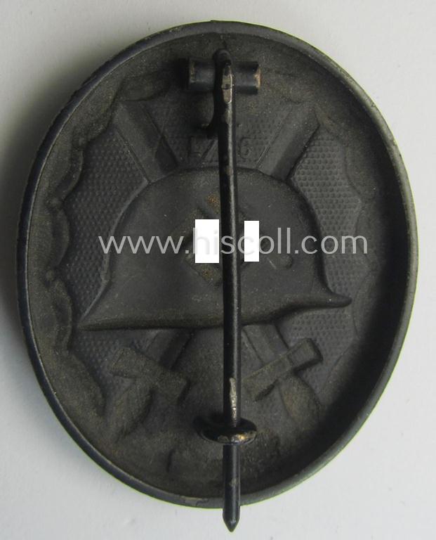 Maker- (ie. 'L/56'-) marked example of a black-class wound-badge (or: 'Verwundeten-Abzeichen in Schwarz') being an example by the maker (ie. 'Hersteller') named: 'Funcke & Brüninghaus'