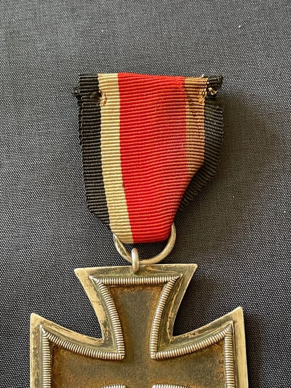 WWII GERMAN IRON CROSS 2ND CLASS NUMBERED RING 24 FOR ARBEITSGEMINSCHAFT FUR HEERESHEDARF IN DER GRAVEUR UBD ZISELIERUNG