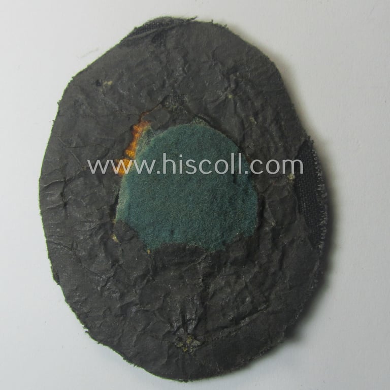 WH (Luftwaffe) 'Fallschirmschützen-Abzeichen in Stoff' (or: cloth-based paratroopers' jump-badge) that is nicely machine-embroidered and being of the so-called: 'padded version'