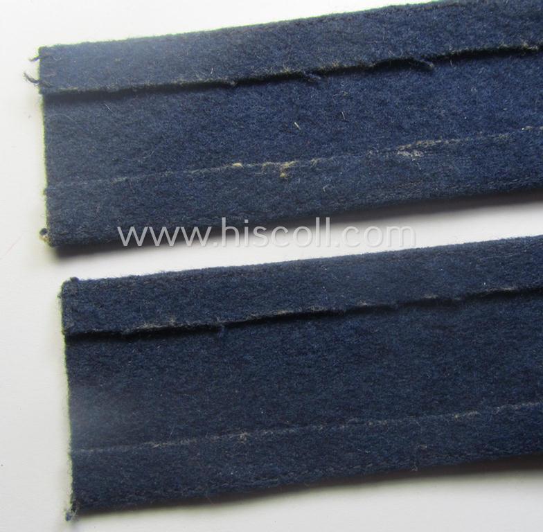 Darker-blue toned, WH (Luftwaffe) cuff-title (ie. 'Ärmelstreifen') entitled: 'Afrika' (being a full-length example that comes in an issued-, used and/or carefully tunic-removed, condition)