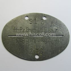 Zinc-based, 'Waffen-SS'-related ID-disc that shows the clearly stamped...