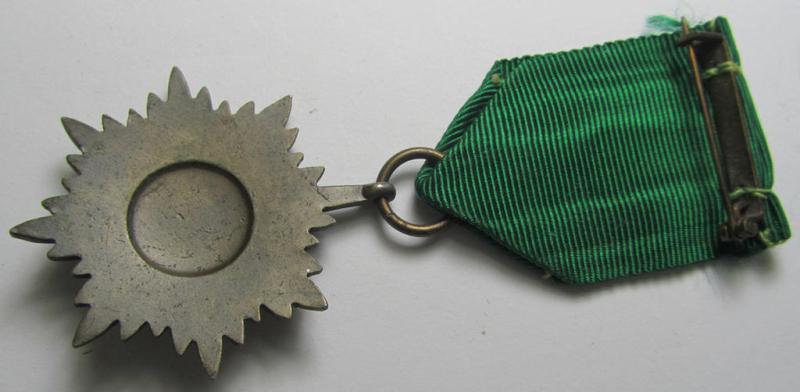 Superb, WH-related so-called: 'Tapferkeitsauszeichnung für Angehörige der Ostvölker, 3. Klasse in Bronze mit Schwertern' (being a non-maker-marked- and/or: 'Feinzink'-based example that comes mounted onto its period ribbon)