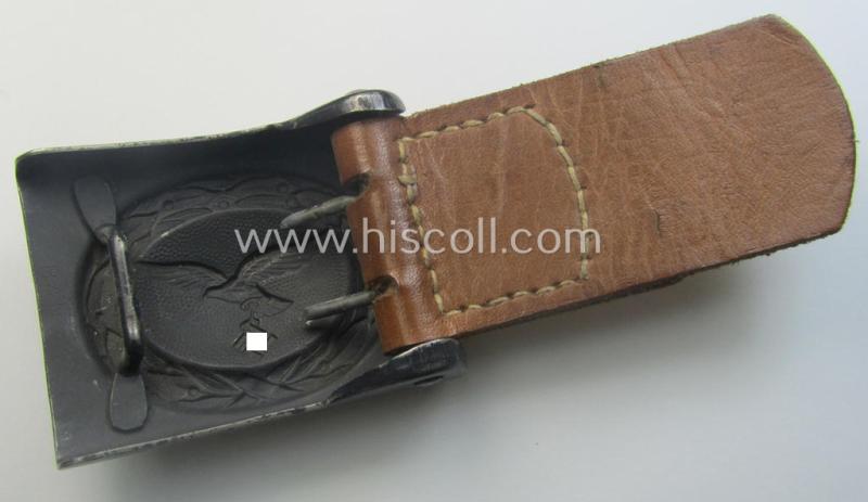 'Virtually mint', 'standard-issue'-pattern, WH (Luftwaffe) bluish-grey-toned- and steel-based belt-buckle being a non-maker-marked example that comes mounted onto its 'Berg u. Nolte A.G.'-marked and/or '1941'-dated tab