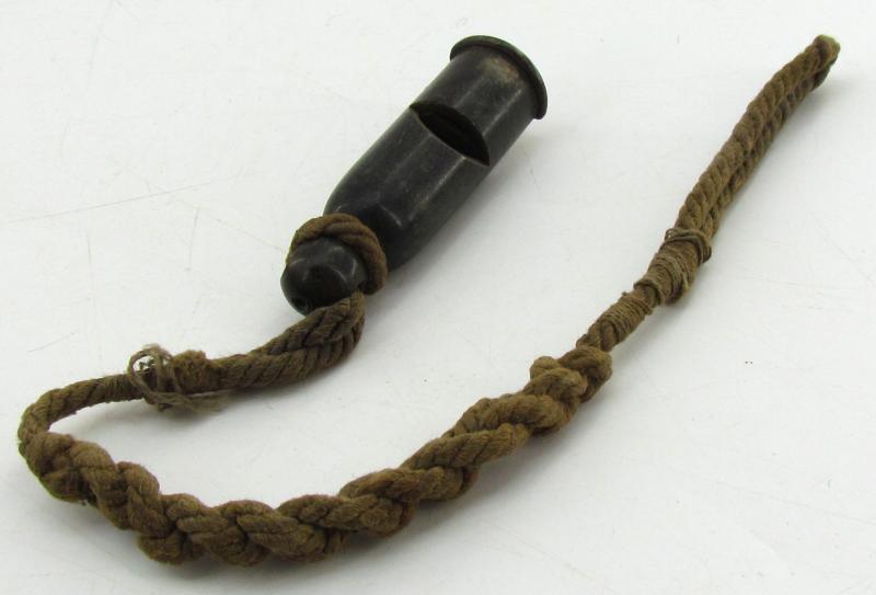 Wehrmacht issue signal whistle with lanyard