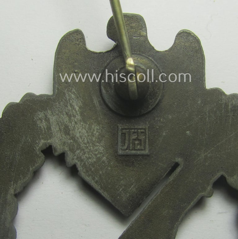 'Infanterie Sturmabzeichen in Bronze' being a maker- (ie. 'JFS'-) marked, 'solid-back' example by the desirable maker: 'Josef Feix u. Söhne' as was executed in golden-bronze-coloured, zinc-based metal