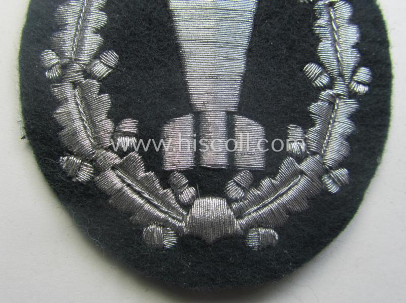 Possibly unique - and truly luxuriously-styled! - WH (Heeres) 'Nebelwerfer Richtkannonier'- (or: qualified smoke-troops canon-operator) patch as executed in the neat 'machine-embroidered' so-called: 'flat-wire'-weave-pattern