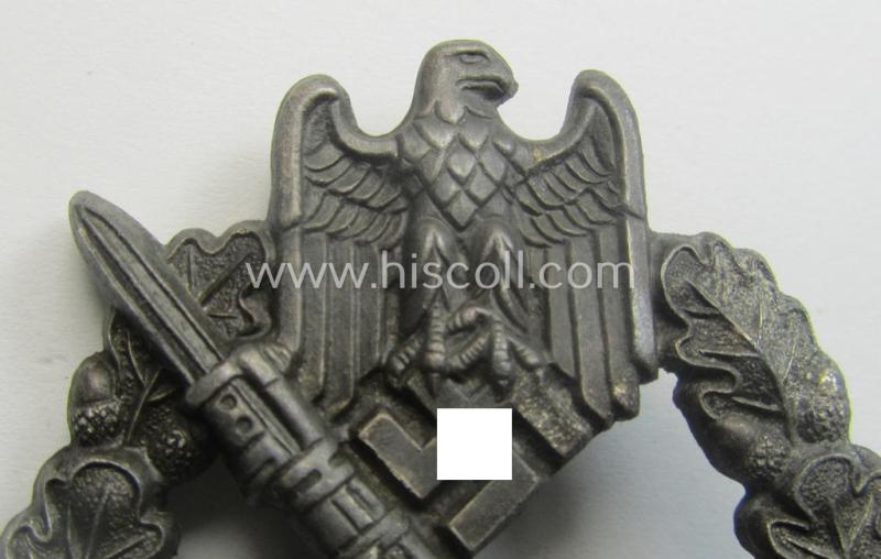 'Variant'-pattern, zinc- (ie. 'Feinzink'-) based example of an: 'Infanterie-Sturmabzeichen in Silber' being a maker- (ie. 'R.S.'-) marked example as produced by the Austrian maker (ie. 'Hersteller') 'Rudolf Souval' based in Wien (Vienna)