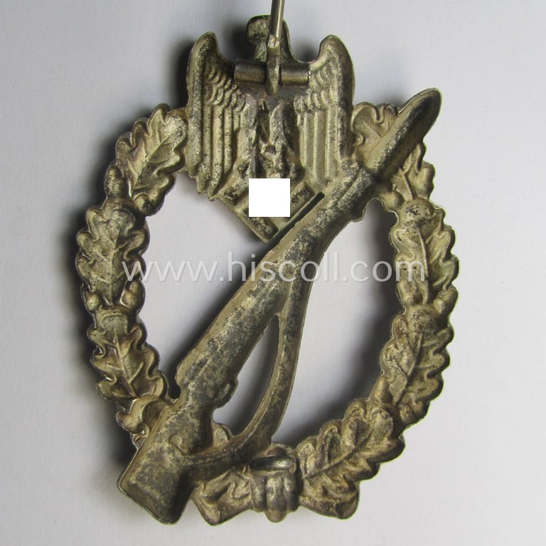 'Infanterie Sturmabzeichen in Silber' (or: silver-class infantry-assault-badge ie. IAB) being a 'Buntmetall'-based example by the: 'Otto Schickle'-company