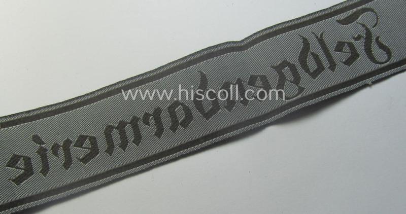Hardly ie. never worn example of a WH (Heeres) cuff-title ie. armband (ie. 'Ärmelstreifen') entitled: 'Feldgendarmerie' (being a typical 'BeVo'-woven example)