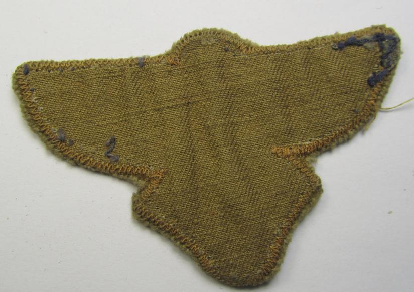 Tan-coloured, so-called: N.S.F.K.- (or: 'National Socialistisches Flieger Korps') breast-eagle being a nicely woven- (and enlisted-mens'-pattern) example that comes mounted on its piece of tan-coloured wool