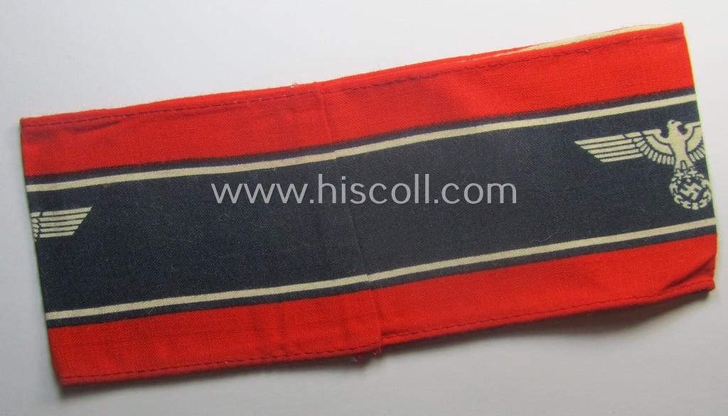 Typically printed- and/or later-war-period, bright-red- and/or black-coloured so-called: 'Deutscher Volkssturm'-armband (ie. 'Armbinde') that comes in an overall very nice- (I deem hardly used- nor worn- ie. 'virtually mint'-), condition