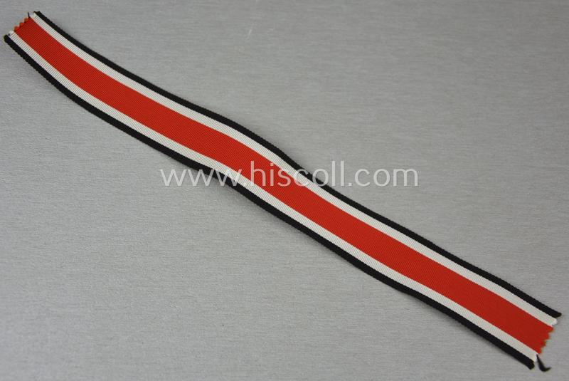 Neat spare-part: a non-confectioned- (ie. full length- ie. 29 cms. long-sized-) ribbon (ie. 'Bandabschitt') as was intended for the: 'Eisernes Kreuz II. Klasse' and that comes in an overall very nice- (ie. 'virtually mint ie. unissued'-), condi...