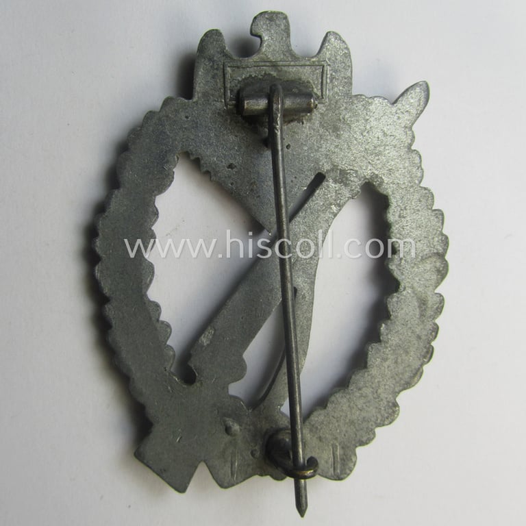 'Infanterie Sturmabzeichen in Silber' being a non-maker-marked and/or typical zinc- (ie. 'Feinzink'-) based version as was (I deem) procuded by the: 'Frank & Reif'-company