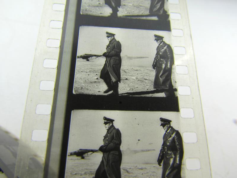 Large Film can with WWII 35mm film included