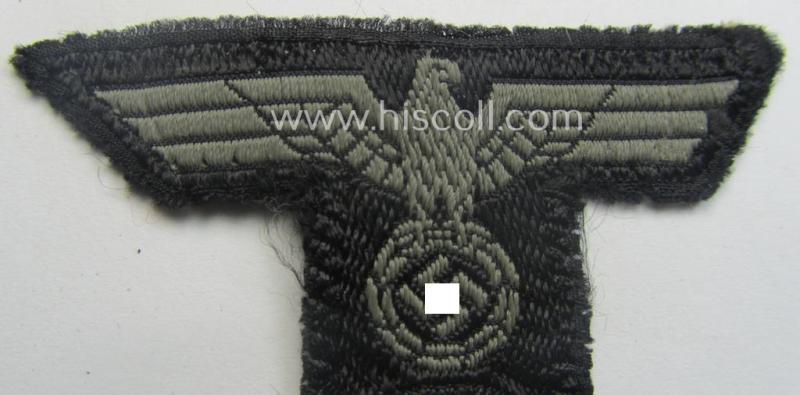 WH (Heeres) 'Panzer'-related, 'T-shaped' ie. 'M42'-pattern cap-eagle/cocarde as executed in 'BeVo'-weave pattern (being a minimally stained example that comes in a clearly used- ie. once cap-attached, condition)
