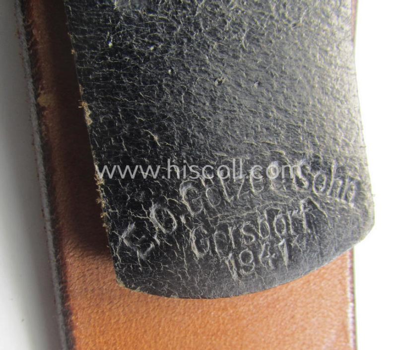 Hardly used, early- (ie. mid-) war-period, black-coloured WH (Heeres, Luftwaffe, Waffen-SS etc.) 'standard-issue'-pattern belt (ie. 'Koppelriemen') being a 100 cms. sized example that shows a (clear) makers'-designation and/or date: '1941'