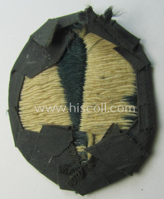 Superb - and rarely encountered! - 'BeVo'-woven version of a WH (Heeres) so-called: trade- and/or special-career insignia as intended for a: 'Nebelwerfer Richtkannonier' (or: qualified smoke-troops canon-operator) that comes in a used condition