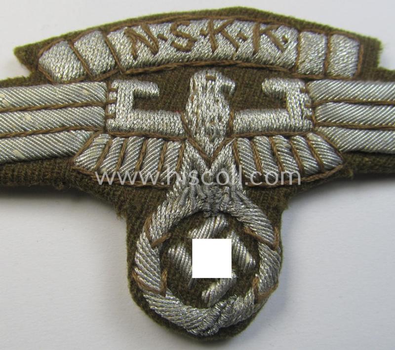N.S.K.K. (ie. 'National Socialistisches Kraftfahr Korps') officers'-pattern, hand-embroidered arm-eagle (being an example of the 'Extra-Qualität' showing extraordinary detail!) still retaining its period-attached 'RzM'-etiket