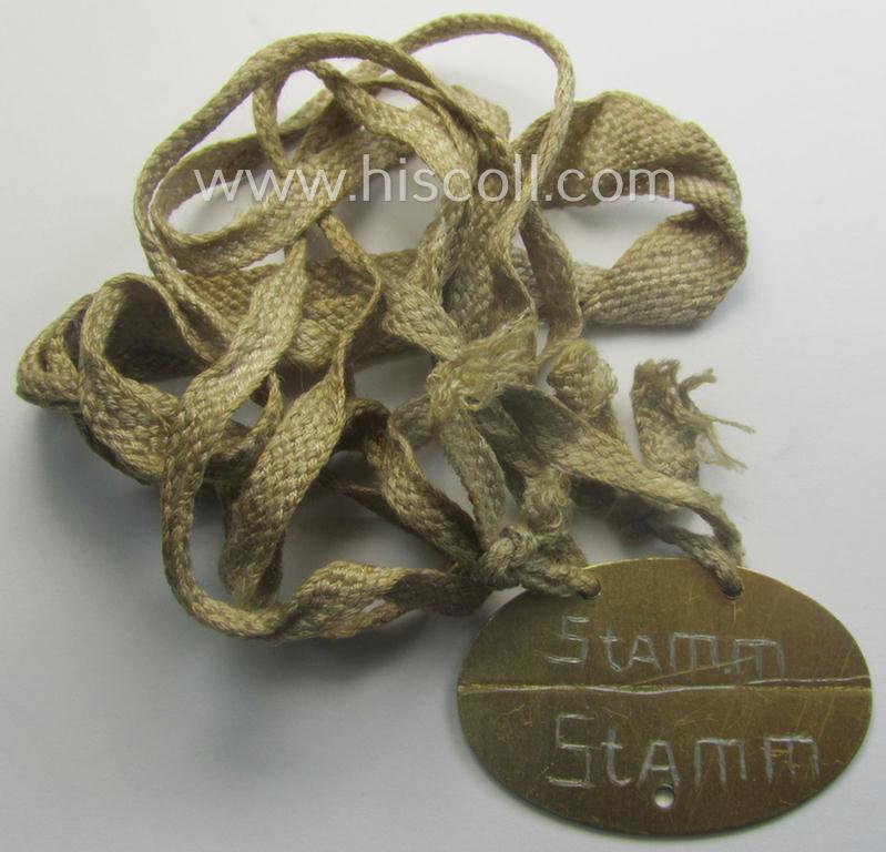 Unusually found - albeit 'standard-issue'-pattern - WH (Kriegsmarine) typical aluminium-based- and/or bright golden-bronze toned ID-disc (ie. 'Erkennungsmarke') bearing the engraved coded numeral (ie. text) that simply reads: 'F.617 Wehr.Beamt.M...