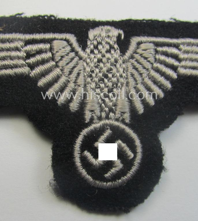 Mid- (ie. later-war-) pattern, 'SS' (ie. 'Waffen-SS') so-called: 'RzM-style' enlisted-mens'-/ie. NCO-pattern arm-eagle as was intended for usage by the various Waffen-SS troops throughout the war