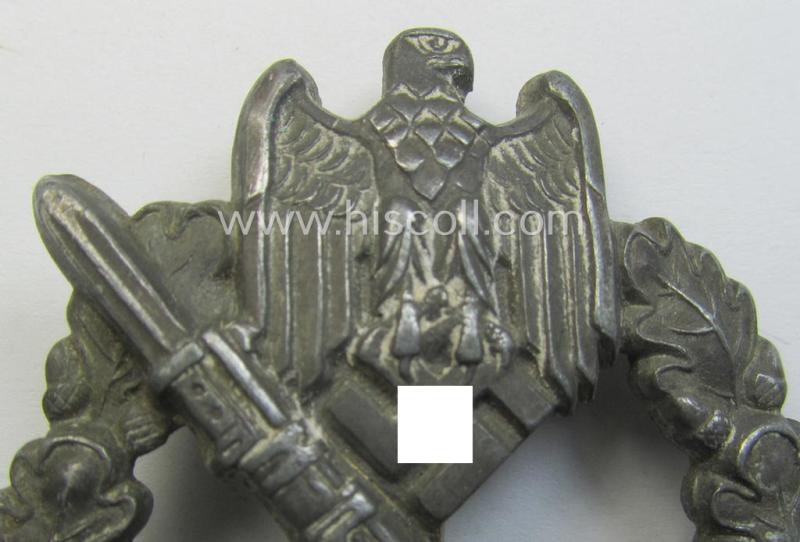Attractive, 'Infanterie Sturmabzeichen in Silber' (or: silver infantry assault badge ie. IAB) being a nicely maker- (ie. 'A'-) marked example as executed in zinc-based metal (ie. 'Feinzink') as was produced by the: 'Assmann & Söhne'-company