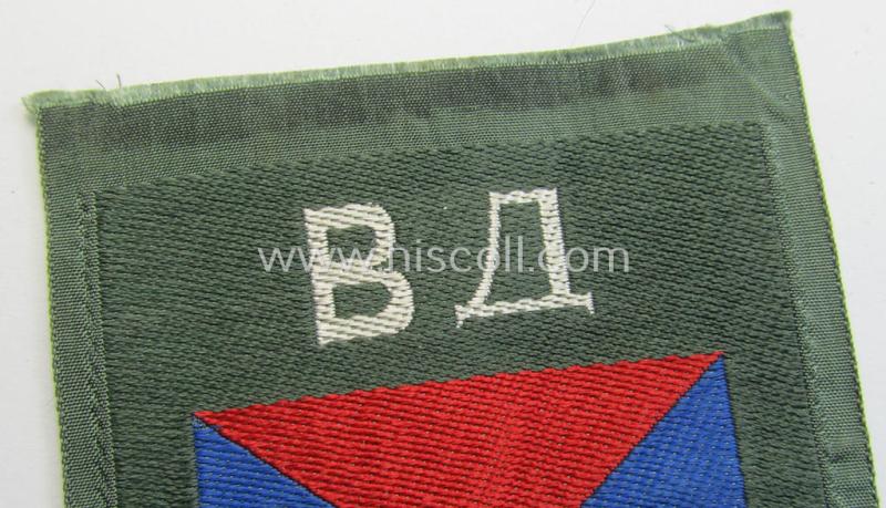 Attractive - and rarely seen! - armshield as executed in the neat 'BeVo'-weave pattern depicting the interwoven 'Cyrillic' characters: 'BA' (as was intended for the Russian volunteers serving within the 'Don Cossacks')