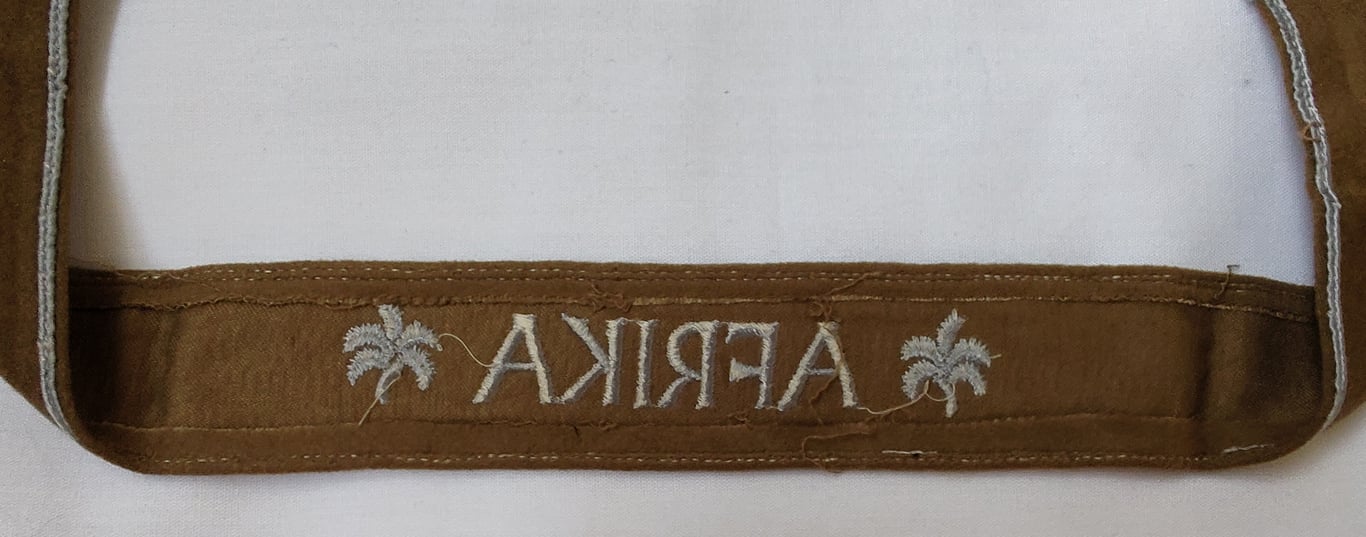 WH cuff-title ('Ärmelstreifen') entitled: 'Afrika'