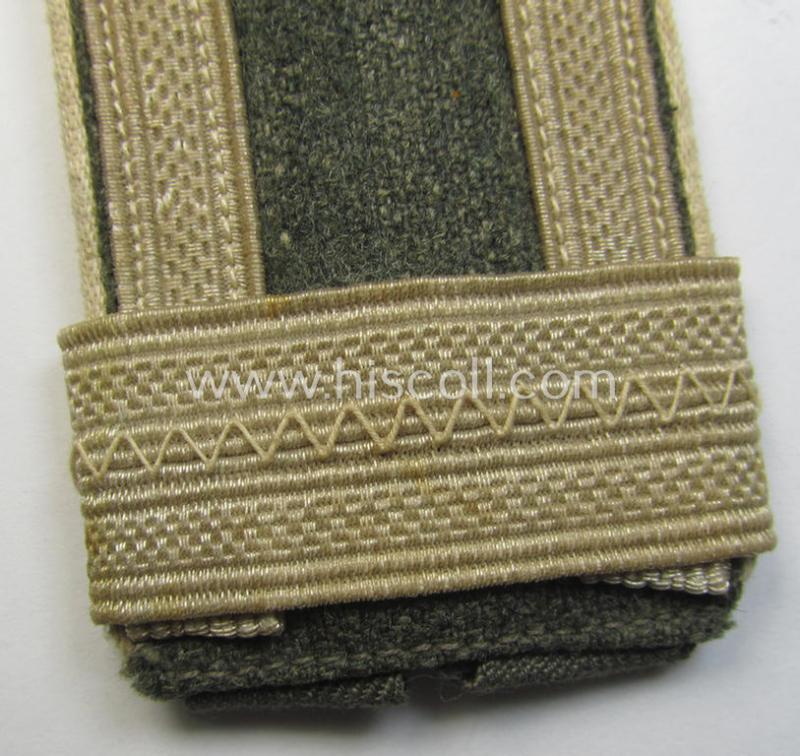 Attractive - albeit regrettably single! - later-war-period- (ie. 'M44 o. M45'-pattern-) WH (Heeres) NCO-type shoulderstrap as was intended for usage by an: 'Unteroffizier u. Offiziers-Anwärter eines Infanterie-Regiments'