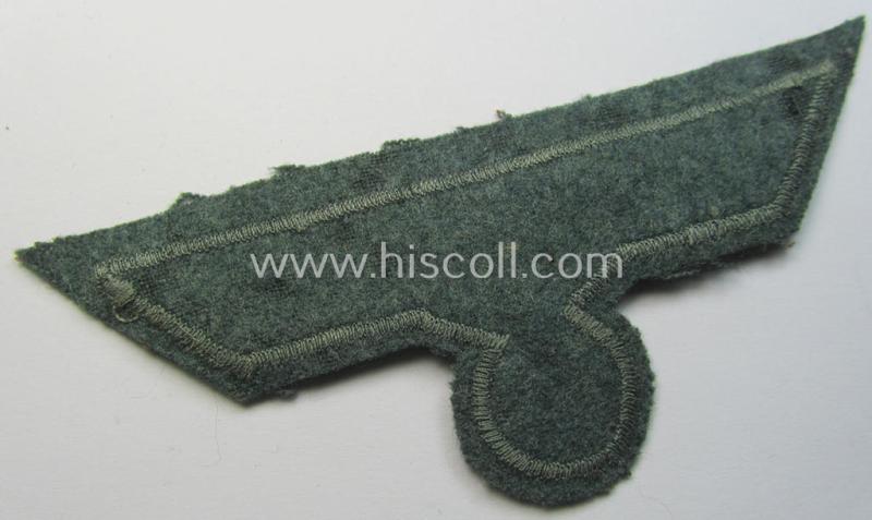 WH (Heeres) breast-eagle as executed in 'BeVo'-type-, so-called: 'flat-wire'-weave-pattern and pre-mounted on field-grey-coloured wool as was specifically intended for usage by soldiers (ie. NCOs) on their dress-tunics (ie. 'Waffenröcke')