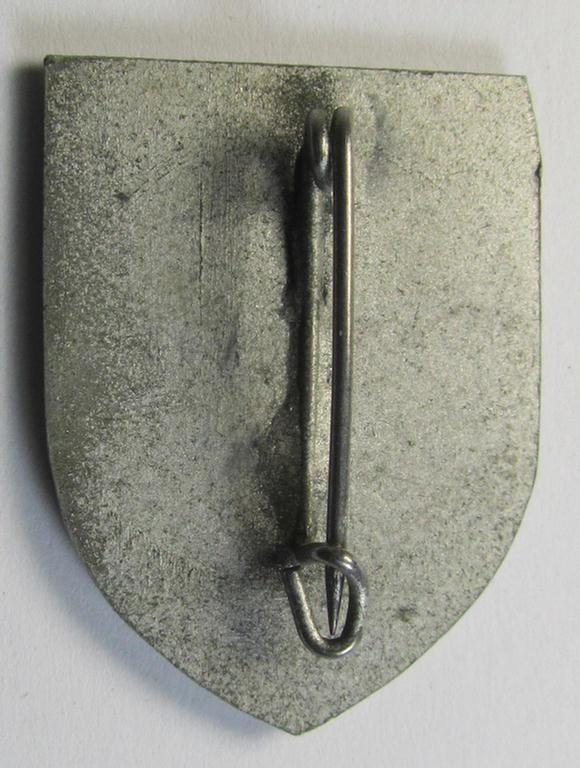 Attractive - and actually quite scarcely encountered! - WH (Heeres) so-called: 'Truppen-Traditionsabzeichen des 215. Infanterie Division' as executed in greyish-coloured zinc-based metal (ie. 'Feinzink')